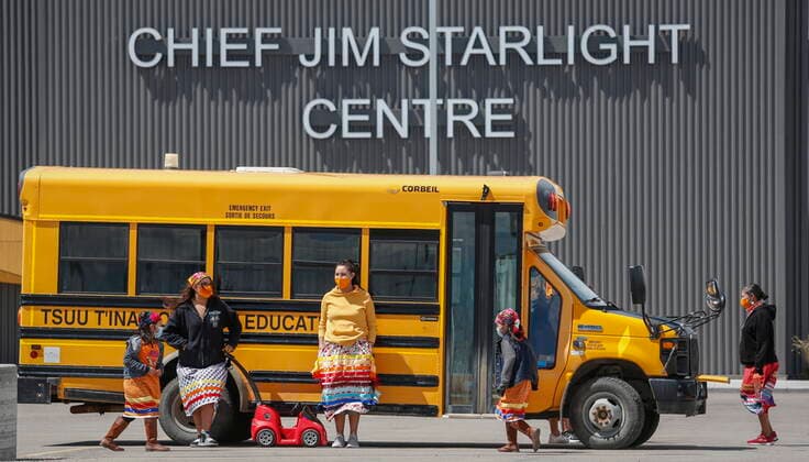 June 7, 2021, Calgary, ab, Canada: Members of the Tsuut ina Nation gather at a school bus after taking part in a silent march in memory of the 215 unmarked graves found at Kamloops, B.C., in Calgary, Alta., Monday, June 7, 2021. Calgary Canada  - ZUMAc35_ 20210607_zaf_c35_039 Copyright: xJeffxMcintoshx