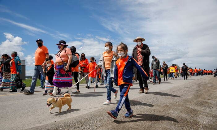 June 7, 2021, Calgary, ab, Canada: Members of the Tsuut ina Nation take part in a silent march in memory of the 215 unmarked graves found at Kamloops, B.C., in Calgary, Alta., Monday, June 7, 2021. Calgary Canada  - ZUMAc35_ 20210607_zaf_c35_042 Copyright: xJeffxMcintoshx
