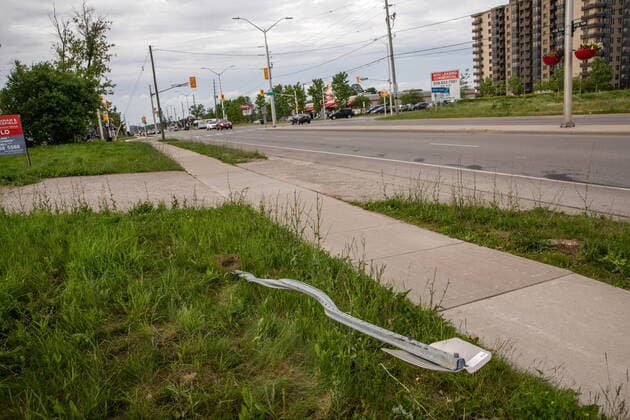June 7, 2021, London, on, Canada: A destroyed street sign at the location where a family of five was hit by a driver, in London, Ont., Monday, June 7, 2021. Four of the members of the family died and one is in critical condition. A 20 year old male has been charged with four counts of first degree murder and count of attempted murder in connection with the crime. London Canada  - ZUMAc35_ 20210607_zaf_c35_049 Copyright: xBrettxGundlockx