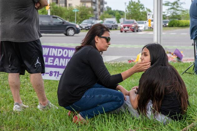June 7, 2021, London, on, Canada: Kay Habib comforts her daughter Leena Qamar at at the location where a family of five was hit by a driver, in London, Ont., Monday, June 7, 2021. Four of the members of the family died and one is in critical condition. A 20 year old male has been charged with four counts of first degree murder and count of attempted murder in connection with the crime. London Canada  - ZUMAc35_ 20210607_zaf_c35_072 Copyright: xBrettxGundlockx