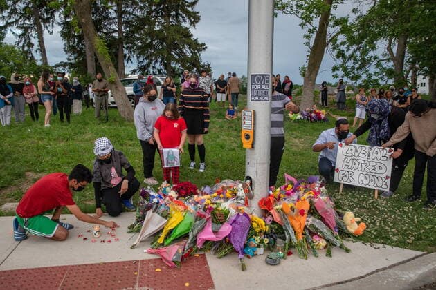 June 7, 2021, London, on, Canada: People attend a memorial at the location where a family of five was hit by a driver, in London, Ont., Monday, June 7, 2021. Four of the members of the family died and one is in critical condition. A 20 year old male has been charged with four counts of first degree murder and count of attempted murder in connection with the crime. London Canada  - ZUMAc35_ 20210607_zaf_c35_069 Copyright: xBrettxGundlockx