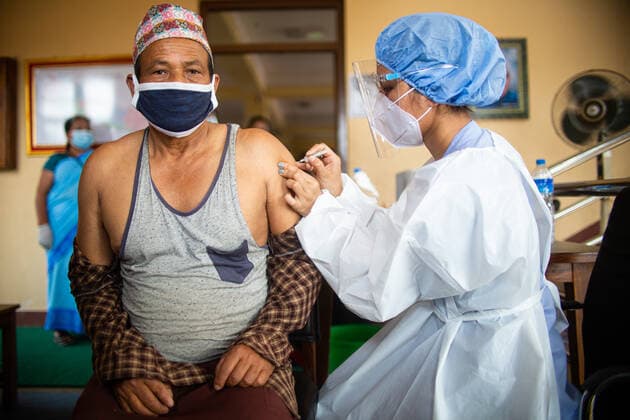 Nepal Continue COVID-19 Vaccination Drive A health worker inoculates a dose of the Vero cell COVID-19 vaccine in Bhaktapur, Nepal on Tuesday, June 8, 2021. After receiving 1 million doses of the COVID-19 vaccine from china, the Nepal government has continued vaccination for the 60-64 age groups. Kathmandu Nepal shrestha-notitle210608_np7Px  Copyright: xRojanxShresthax