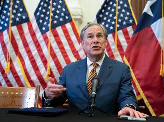 June 8, 2021, Austin, TX, United States: Texas Gov. GREG ABBOTT answers press questions after signing two bills strengthening the Texas power grid and infrastructure that were emergency items on his legislative agenda. The bills were in response to February s winter storm that nearly knocked out the Texas power grid. At left is Rep. CHRIS PADDIE , R-Marshall. Austin United States - ZUMAd150 20210608_znp_d150_026 Copyright: xBobxDaemmrichx
