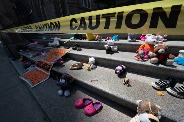 June 8, 2021, Vancouver, BC, Canada: children s shoes are seen on the steps of the Holy Rosary Catholic Cathedral in downtown Vancouver, Tuesday, June 8, 2021. The shoes represent missing indigenous children after the remains of 215 children were discovered buried near the former Kamloops Indian Residential School. Vancouver Canada  - ZUMAc35_ 20210608_zaf_c35_088 Copyright: xJonathanxHaywardx