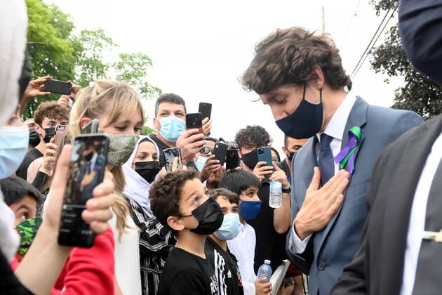 June 8, 2021, London, on, Canada: Prime Minister Justin Trudeau greets mourners before the start of a vigil for the victims of the deadly vehicle attack on five members of the Canadian Muslim community in London, Ont., on Tuesday, June 8, 2021. Four of the members of the family died and one is in critical condition. Police have charged a London man with four counts of murder and one count of attempted murder. London Canada  - ZUMAc35_ 20210608_zaf_c35_101 Copyright: xNathanxDenettex