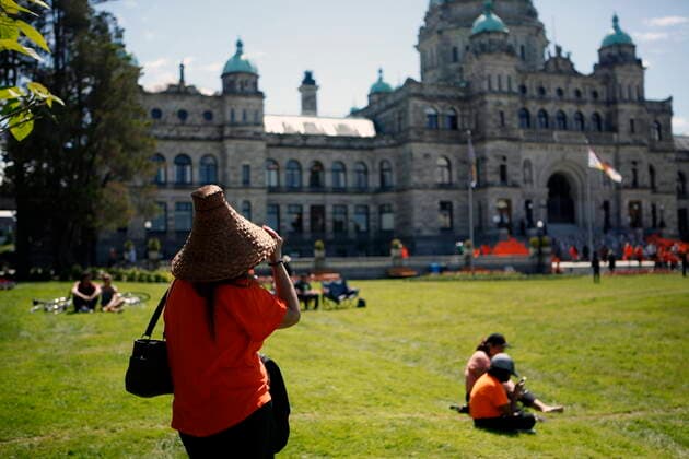 June 8, 2021, Victoria, BC, Canada: Orange shirts, shoes, flowers and messages are displayed on the steps outside the legislature in Victoria, B.C., on Tuesday, June 8, 2021 following a ceremony hosted by the Songhees and Esquimalt First Nations in honour of the 215 residential school children whose remains have been discovered buried near the facility in Kamloops, B.C. Victoria Canada - ZUMAc35_ 20210608_zaf_c35_111 Copyright: xChadxHipolitox