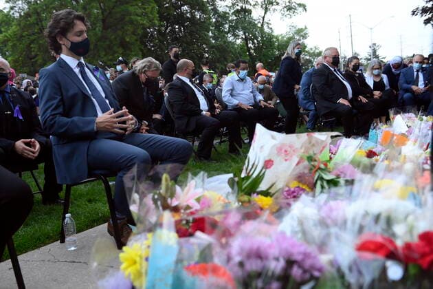 June 8, 2021, London, on, Canada: Prime Minister Justin Trudeau, left, and Ontario Premier Doug Ford, fourth from right, look on during a vigil for the victims of the deadly vehicle attack on five members of the Canadian Muslim community in London, Ont., on Tuesday, June 8, 2021. Four of the members of the family died and one is in critical condition. Police have charged a London man with four counts of murder and one count of attempted murder. London Canada - ZUMAc35_ 20210608_zaf_c35_151 Copyright: xNathanxDenettex