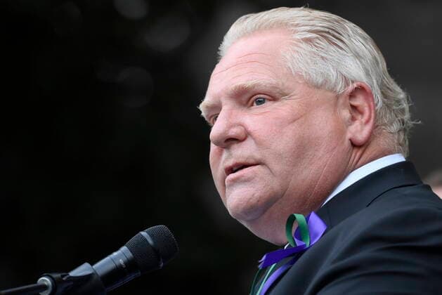 June 8, 2021, London, on, Canada: Ontario Premier Doug Ford speaks at a vigil for the victims of the deadly vehicle attack on five members of the Canadian Muslim community in London, Ont., on Tuesday, June 8, 2021. Four of the members of the family died and one is in critical condition. Police have charged a London man with four counts of murder and one count of attempted murder. London Canada  - ZUMAc35_ 20210608_zaf_c35_153 Copyright: xNathanxDenettex