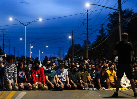 June 8, 2021, London, on, Canada: People pray at a vigil outside the London Muslim Mosque for the victims of the deadly vehicle attack on five members of the Canadian Muslim community in London, Ont., on Tuesday, June 8, 2021. Four of the members of the family died and one is in critical condition. London Canada  - ZUMAc35_ 20210608_zaf_c35_166 Copyright: xNathanxDenettex
