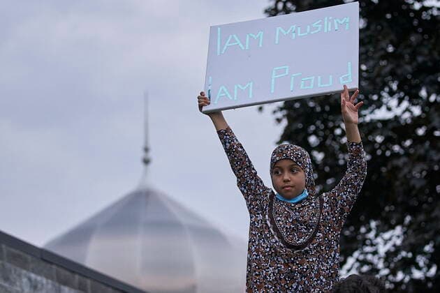 June 8, 2021, London, on, Canada: A young girl holds a sign during a vigil at the London Muslim Mosque in London, Ont. on Tuesday, June 8, 2021, in honour of the four members of a Muslim family that died and the youngest boy who is in hospital. London Canada  - ZUMAc35_ 20210608_zaf_c35_179 Copyright: xGeoffxRobinsx
