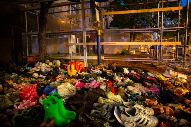 June 8, 2021, Toronto, on, Canada: Children s shoes, left in honour of the 215 children whose bodies were discovered at the Kamloops Indian Residential School are placed next to the wood surrounding the base of the former statue of Egerton Ryerson, in Toronto on Tuesday, June 8, 2021, after it was toppled by protesters on June 6, 2021. Toronto Canada - ZUMAc35_ 20210608_zaf_c35_181 Copyright: xChrisxYoungx