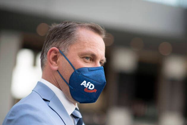 Tino Chrupalla, AfD DEU, Deutschland, Germany, Berlin, 07.06.2021 Tino Chrupalla, Parteivorsitzender der AfD, mit Maske Logo AfD waehrend der PK von der Partei AfD, Alternative fuer Deutschland, bei der Bundespressekonferenz einen Tag nach den Landtagswahlen in Sachsen-Anhalt in Berlin. en: Tino Chrupalla, leader of the right-wing party AfD, Alternative fuer Deutschland, Alternative for Germany, federal spokesman, with protection mask during a press call at the federal press conference, Bundespressekonferenz, the day after the elections in the eastern German state of Saxony-Anhalt in Berlin, Germany. The German CDU emerged in Saxony-Anhalt as the strong winner with 37.1% of the vote, soundly defeating the far-right Alternative for Germany
