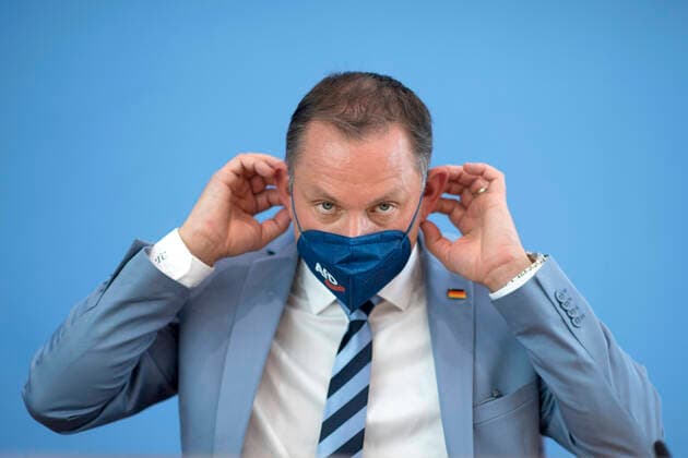 Tino Chrupalla, AfD DEU, Deutschland, Germany, Berlin, 07.06.2021 Tino Chrupalla, Parteivorsitzender der AfD, mit Maske Logo AfD waehrend der PK von der Partei AfD, Alternative fuer Deutschland, bei der Bundespressekonferenz einen Tag nach den Landtagswahlen in Sachsen-Anhalt in Berlin. en: Tino Chrupalla, leader of the right-wing party AfD, Alternative fuer Deutschland, Alternative for Germany, federal spokesman, with protection mask during a press call at the federal press conference, Bundespressekonferenz, the day after the elections in the eastern German state of Saxony-Anhalt in Berlin, Germany. The German CDU emerged in Saxony-Anhalt as the strong winner with 37.1% of the vote, soundly defeating the far-right Alternative for Germany