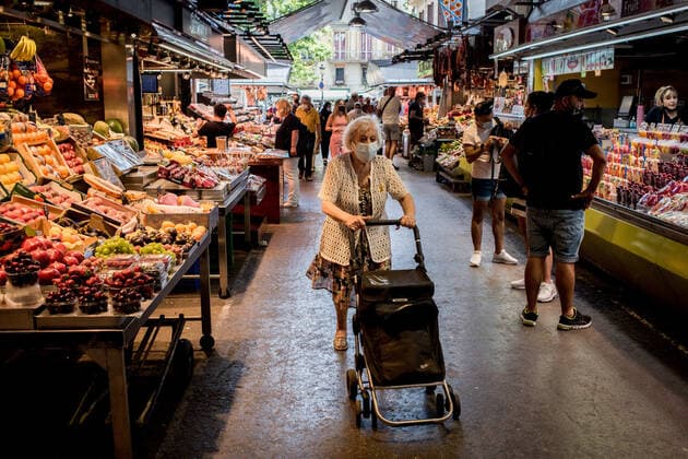 June 11, 2021, Barcelona, Spain: On this Friday morning a woman pushes a shopping trolley at La Boqueria market in La Rambla of Barcelona where the presence of tourists among locals is increasing. Spain aims to boost tourism industry recovering visitors after more than a year of the coronavirus pandemic and has started to issue and accept the QR codes, which allow travelers freedom of movement with no need to show coronavirus tests nor quarantine if they meet the required criteria. Barcelona Spain - ZUMAb137 20210611_zap_b137_004 Copyright: xJordixBoixareux
