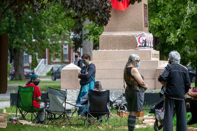 June 11, 2021, Kingston, Ontario, Canada: The statue of former Canadian Prime Minister Sir John A Macdonald is covered by a red sheet in Kingston, Ontario on Friday June 11, 2021. Local indigenous groups want the statue removed but the City of Kingston has not decided what to do with the statue and is leaving it up in the mean time. Kingston Canada  - ZUMAc35_ 20210611_zaf_c35_052 Copyright: xLarsxHagbergx