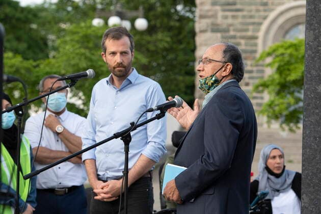 June 11, 2021, QUEBEC, PQ, Canada: Boufeldja Benabdallah, co-founder of the Islamic Cultural Centre of Quebec City, right, speaks as Joel Lightbound, Parliamentary Secretary to the Minister of Public Safety and Emergency Preparedness looks on at a vigil to honor the victims of an anti-Muslim attack in London Ont. Friday, June 11, 2021 in Quebec City. QUEBEC Canada - ZUMAc35_ 20210611_zaf_c35_120 Copyright: xJacquesxBoissinotx