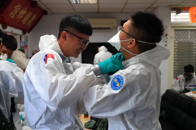 June 12, 2021, New Taipei, New Taipei, Taiwan: Chemical troops wear personal protective equipment(PPE) as they prepare for disinfection of public areas in New Taipei, a zone deeply affected by the community transmission of Covid-19. Taiwan has seen an increasing number of domestic cases and deaths related to the coronavirus while facing an inadequate supply of vaccines. New Taipei Taiwan - ZUMAs313 20210612_zip_s313_003 Copyright: xDanielxCengxShou-Yix