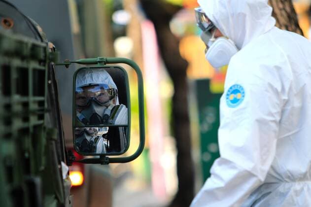 June 12, 2021, New Taipei, New Taipei, Taiwan: A chemical troop soldier wearing a PPE seen on a military vehicle, as they disinfect public areas in New Taipei, a zone deeply affected by the community transmission of Covid-19. Taiwan has seen an increasing number of domestic cases and deaths related to the coronavirus while facing an inadequate supply of vaccines. New Taipei Taiwan - ZUMAs313 20210612_zip_s313_008 Copyright: xDanielxCengxShou-Yix