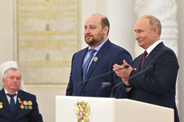 MOSCOW, RUSSIA - JUNE 12, 2021: Russia s President Vladimir Putin and Denis Logunov (R-L), Deputy Head for Science at Gamaleya Research Institute of Epidemiology and Microbiology, a winner of the 2020 State Prize in science and technology, a winner of the 2020 State Prize in literature and arts, attend a ceremony held at the Moscow Kremlin on Russia Day to present state decorations and prizes. Yevgeny Odinokov Russian Presidential Press and Information Office TASS  TS1046F7