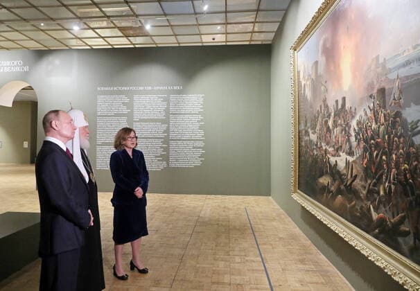 MOSCOW, RUSSIA - JUNE 12, 2021: Russiaâ€™s President Vladimir Putin, Patriarch Kirill of Moscow and all Russia, and State Tretyakov Gallery Director Zelfira Tregulova (L-R) attend the exhibition History of Russia as seen by Artists. To the 800th Birth Anniversary of Alexander Nevsky at the State Tretyakov Gallery. The exhibition shows over 100 paintings from 37 Russian museums and three private collections. Alexander Shcherbak TASS  TS104705