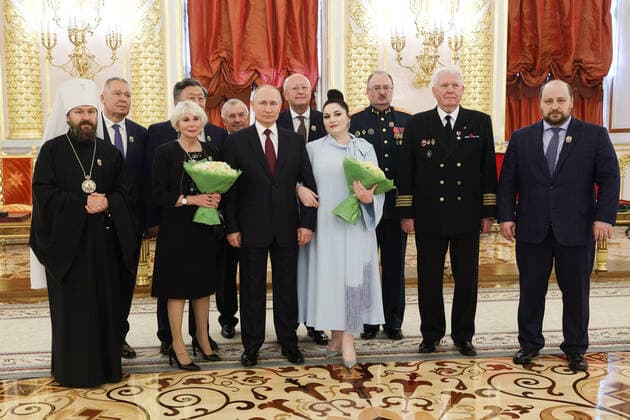 MOSCOW, RUSSIA - JUNE 12, 2021: Russia s President Vladimir Putin (C), Metropolitan Ilarion of Volokolamsk, Chairman of the Department of External Church Relations of the Moscow Patriarchate, Alexander Rukavishnikov, head of the sculpture and composition chair at Surikov Art Institute, Life Line Charity Foundation President Faina Zakharova, Yevgeny Choinzonov, Director of the Tomsk National Research Medical Centre, Alexander Gintsburg, Head of Gamaleya Research Institute of Epidemiology and Microbiology, Nemirovich-Danchenko Musical Theatre opera singer Hibla Gerzmava, Sergei Borisevich, Chief of the Russian Defence Ministry s 48th Central Scientific Research Institute, Gennady Antokhin, captain instructor of the security and quality depart TS104707