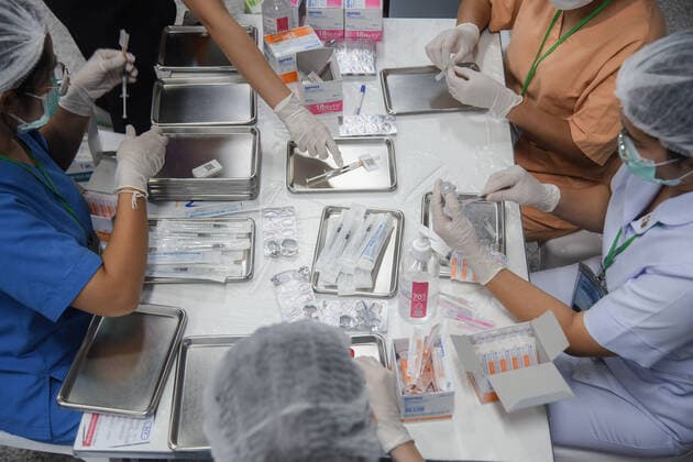 June 12, 2021, Bangkok, Thailand: Health workers prepare to administer the AstraZeneca COVID-19 vaccine during a campaign to vaccinate the population against the Covid-19..On the vaccination progress, Ministry of Public Health reported, as of Friday, 5.97 million people got the vaccines. Thai government aims to inoculate 50 million people, or 70% of the population, by the end of the year. Bangkok Thailand - ZUMAs197 20210612_zaa_s197_161 Copyright: xYuttachaixKongprasertx