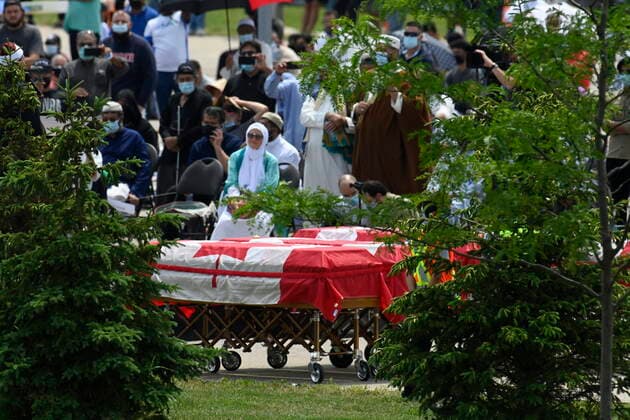 June 12, 2021, London, on, Canada: Four caskets, covered in the Canadian flags, are shown during the funeral for the four Muslim family members killed in a deadly vehicle attack, in London, Ont., on Saturday, June 12, 2021. Talat Afzaal, 74, her son Salman Afzaal, 46, his wife Madiha Salman, 44, and their 15-year-old daughter Yumna Salman all died last Sunday night while out for a walk after a man in a truck drove them down in what police have called a premeditated attack because they were Muslim. London Canada - ZUMAc35_ 20210612_zaf_c35_034 Copyright: xFrankxGunnx