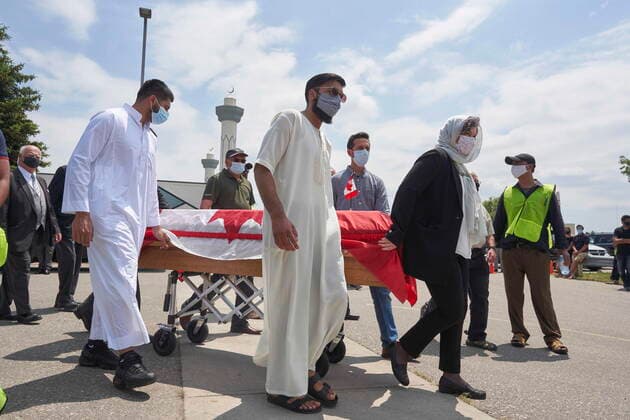 June 12, 2021, London, on, Canada: Pallbearers guide one of the four caskets at funeral service for the victims of the deadly vehicle attack on five members of the Canadian Muslim community in London, Ont., on Saturday, June 12, 2021. Four members of the family died and one is in critical but stable condition. A 20-year-old male is in custody and has been charged in what police say is a motivated hate crime. London Canada  - ZUMAc35_ 20210612_zaf_c35_036 Copyright: xGeoffxRobinsx