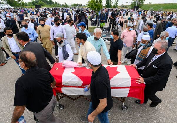 June 12, 2021, London, on, Canada: People escort a casket to a hearses after the funeral service for the four victims of the deadly vehicle attack of on members of the Canadian Muslim community in London, Ont., on Saturday, June 12, 2021.Talat Afzaal, 74, her son Salman Afzaal, 46, his wife Madiha Salman, 44, and their 15-year-old daughter Yumna Salman all died last Sunday night while out for a walk after a man in a truck drove them down in what police have called a premeditated attack because they were Muslim. London Canada - ZUMAc35_ 20210612_zaf_c35_078 Copyright: xNathanxDenettex