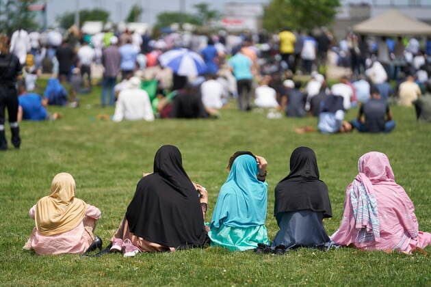 June 12, 2021, London, on, Canada: Thousnds of people attend the funeral service for the four victims of a deadly vehicle attack in London, Ont., on Saturday, June 12, 2021. Talat Afzaal, 74, her son Salman Afzaal, 46, his wife Madiha Salman, 44, and their 15-year-old daughter Yumna Salman all died last Sunday night while out for a walk after a man in a truck drove them down in what police have called a premeditated attack because they were Muslim. London Canada - ZUMAc35_ 20210612_zaf_c35_082 Copyright: xGeoffxRobinsx