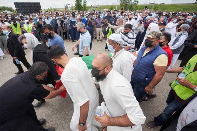 June 12, 2021, London, on, Canada: Pallbearers guide one of the four caskets at the funeral service for the victims of a deadly vehicle attack in London, Ont., on Saturday, June 12, 2021.Talat Afzaal, 74, her son Salman Afzaal, 46, his wife Madiha Salman, 44, and their 15-year-old daughter Yumna Salman all died last Sunday night while out for a walk after a man in a truck drove them down in what police have called a premeditated attack because they were Muslim. London Canada - ZUMAc35_ 20210612_zaf_c35_091 Copyright: xGeoffxRobinsx