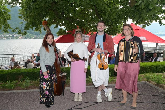 Second of four parts of the event Hausmusikroas , with local folk musicians, on squares of the town of Gmunden,