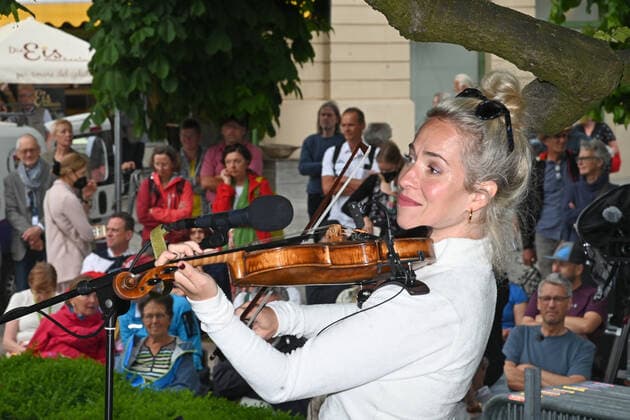 Second of four parts of the event Hausmusikroas , with local folk musicians, on squares of the village Gmunden, in the Upper Austrian Salzkammergut, as part of