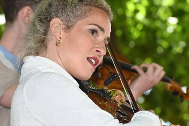 Second of four parts of the event Hausmusikroas , with local folk musicians, on squares of the village Gmunden, in the Upper Austrian Salzkammergut, as part of the Salzka