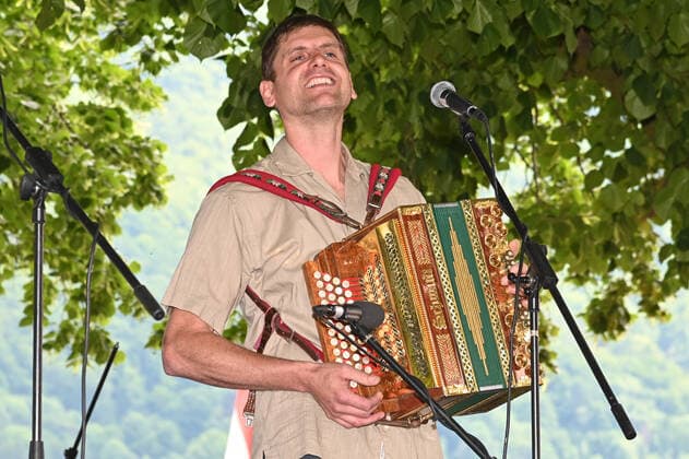 Second of four parts of the event Hausmusikroas , with local folk musicians, on squares of the town of Gmunden, in the Upper Austrian Salzkammergut, as part of