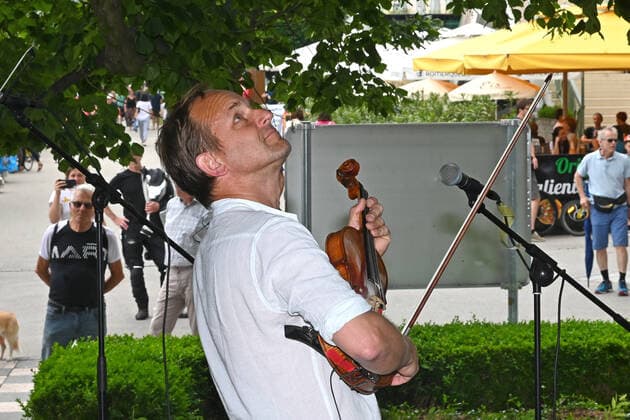 Second of four parts of the event Hausmusikroas , with local folk musicians, on squares of the town of Gmunden, in the Upper Austrian Salzkammergut, as part of the Sal