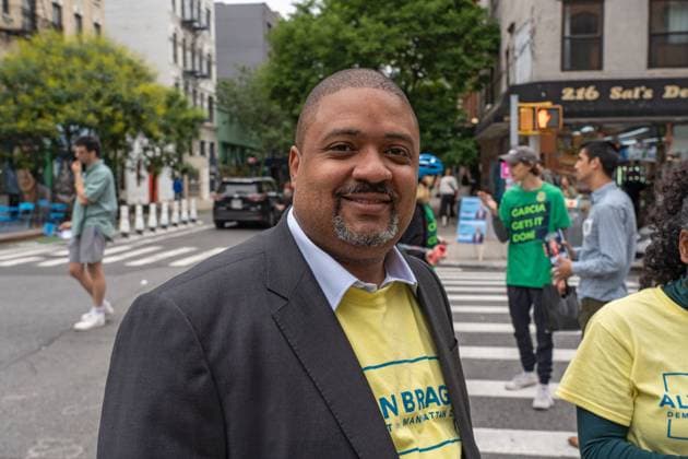 June 12, 2021, New York, United States: Alvin Bragg campaigns outside a polling location at Campos Plaza Community Center in New York City. New York United States - ZUMAs197 20210612_zaa_s197_439 Copyright: xRonxAdarx
