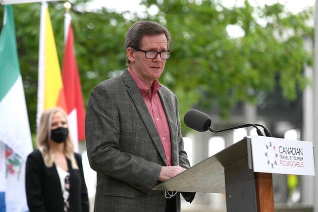 June 14, 2021, Ottawa, on, Canada: Mike McNaney, President and CEO of the National Airlines Council of Canada which represents Air Canada, Air Transat, Jazz Aviation and Westjet, speaks during a news conference held by the Canadian Travel and Tourism Roundtable, a coalition of airports, airlines, hotels, boards of trade and chambers of commerce, to urge the federal government to implement a re-opening plan for travel and tourism, at the Ottawa Airport in Ottawa, on Monday, June 14, 2021. Ottawa Canada  - ZUMAc35_ 20210614_zaf_c35_070 Copyright: xJustinxTangx