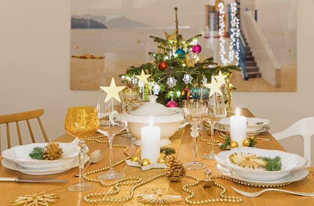 Festive Christmas table with small Christmas tree in background property released GWF06991