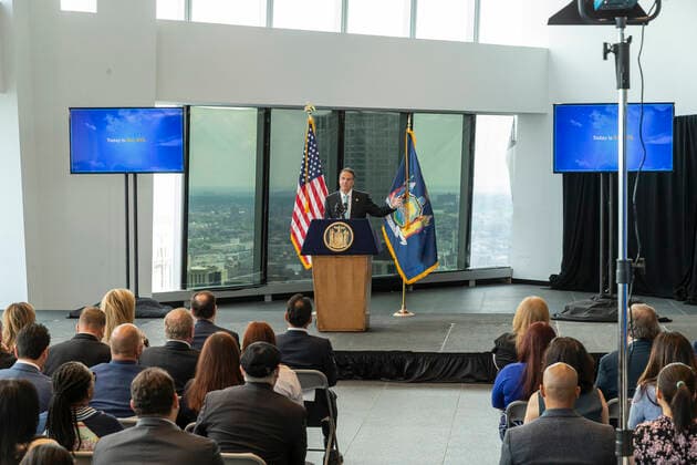 New York: Governor Cuomo Announces COVID-19 Restrictions Lifted Governor Cuomo announced COVID-19 restrictions lifted as 70% of adult New Yorkers have received first dose of vaccine at One World Trade Center. Governor praised all New Yorkers for doing their parts during pandemic. Governor especially lauded essential workers and presented awards to those who carried New York State through the COVID-19 pandemic. Governor said that mask requirement for unvaccinated individuals and in certain settings (e.g., large-scale indoor event venues, pre-K to grade 12 schools, public transit, homeless shelters, correctional facilities, nursing homes and health care settings per CDC guidance) will stay in place. New York New York United States One World Copyright: LevxRadin