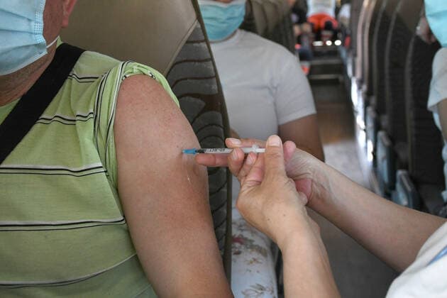 Croatia Coronavirus vaccine bus A medical worker administers a dose of the COVID-19 vaccine in Coronavirus vaccine bus in Bjelovar, Croatia on June 17, 2021. Coronavirus vaccine bus travelling around city of Bjelovar and suburbs offering a walk-in vaccine service. DamirxSpehar PIXSELL