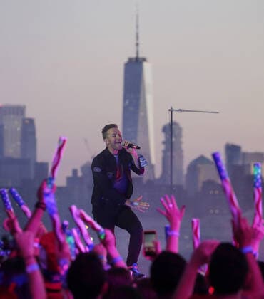 Chris Martin and Coldplay perform during a taped free concert in front of One World Trade Center and the Manhattan skyline for Macy s Fourth of July special in New York City on Thursday, June 17, 2021.  NYP20210617137 JohnxAngelillo
