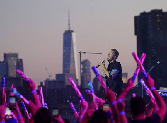 Chris Martin and Coldplay perform during a taped free concert in front of One World Trade Center and the Manhattan skyline for Macy s Fourth of July special in New York City on Thursday, June 17, 2021.  NYP20210617132 JohnxAngelillo