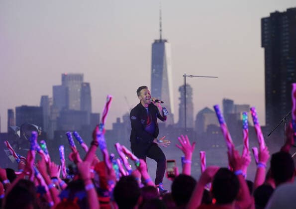 Chris Martin and Coldplay perform during a taped free concert in front of One World Trade Center and the Manhattan skyline for Macy s Fourth of July special in New York City on Thursday, June 17, 2021.  NYP20210617135 JohnxAngelillo
