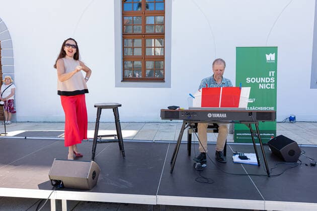 Small concert at Obermarkt Freiberg Summertime with Susanne Engelhardt and Jörg Pitschmann on 18 06 2021 Susanne Engelhardt, soprano voice and Jörg Pitschmann, piano and general music director Freiberg Obermarkt Saxony Germany