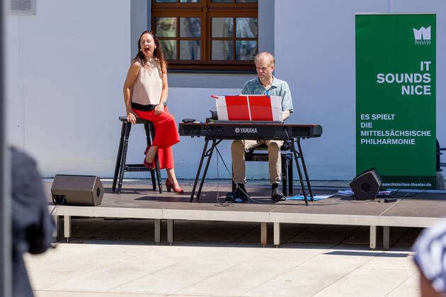 Small concert at Obermarkt Freiberg Summertime with Susanne Engelhardt and Jörg Pitschmann on 18 06 2021 Susanne Engelhardt, soprano voice and Jörg Pitschmann, piano and general music director Freiberg Obermarkt Saxony Germany