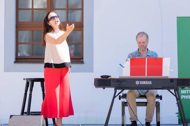 Small concert at Obermarkt Freiberg Summertime with Susanne Engelhardt and Jörg Pitschmann on 18 06 2021 Susanne Engelhardt, soprano voice and Jörg Pitschmann, piano and general music director Freiberg Obermarkt Saxony Germany