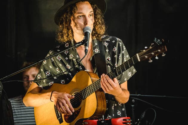 Daens live in Bern, Switzerland Bern, Switzerland. 18th, June 2021. The Swiss band Daens performs a live garden concert at Bierh?beli in Bern. Here singer and musician Daniel Beltrametti is seen live on stage. Bern Switzerland  Copyright: xGonzalesxPhoto TilmanxJentzschx