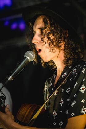 Daens live in Bern, Switzerland Bern, Switzerland. 18th, June 2021. The Swiss band Daens performs a live garden concert at Bierh?beli in Bern. Here singer and musician Daniel Beltrametti is seen live on stage. Bern Switzerland  Copyright: xGonzalesxPhoto TilmanxJentzschx