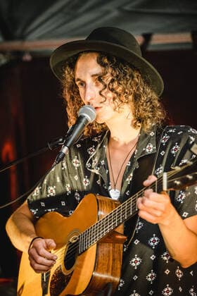 Daens live in Bern, Switzerland Bern, Switzerland. 18th, June 2021. The Swiss band Daens performs a live garden concert at Bierh?beli in Bern. Here singer and musician Daniel Beltrametti is seen live on stage. Bern Switzerland  Copyright: xGonzalesxPhoto TilmanxJentzschx